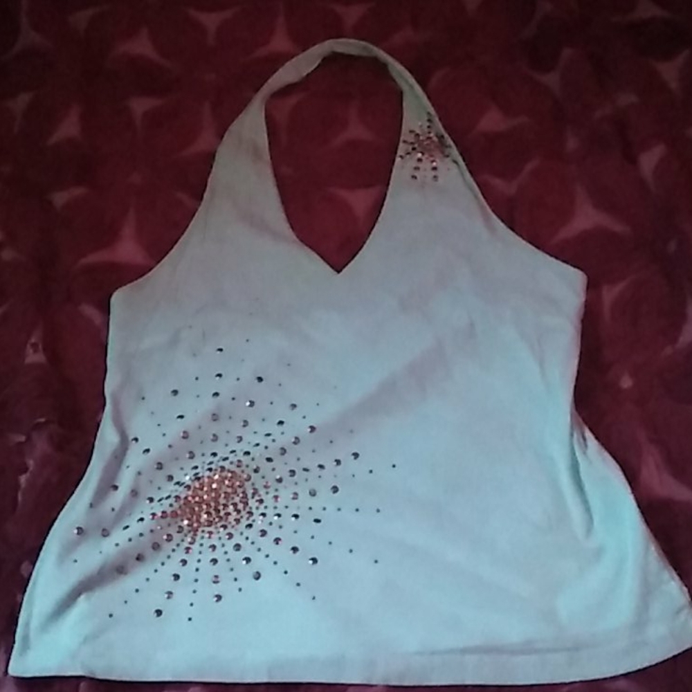 Baby blue halter top with stud effects.